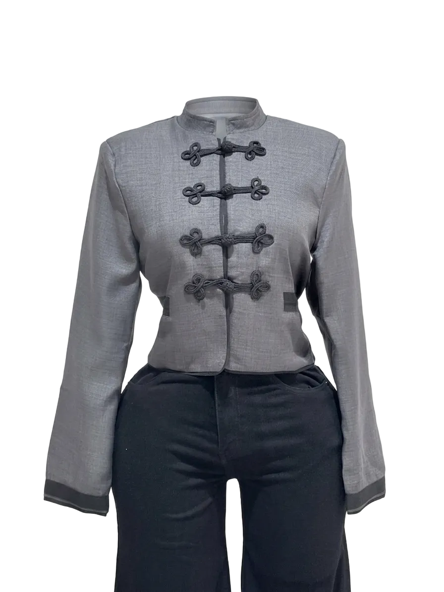 BLUSA GRIS MANGA LARGA DETALLE NEGRO